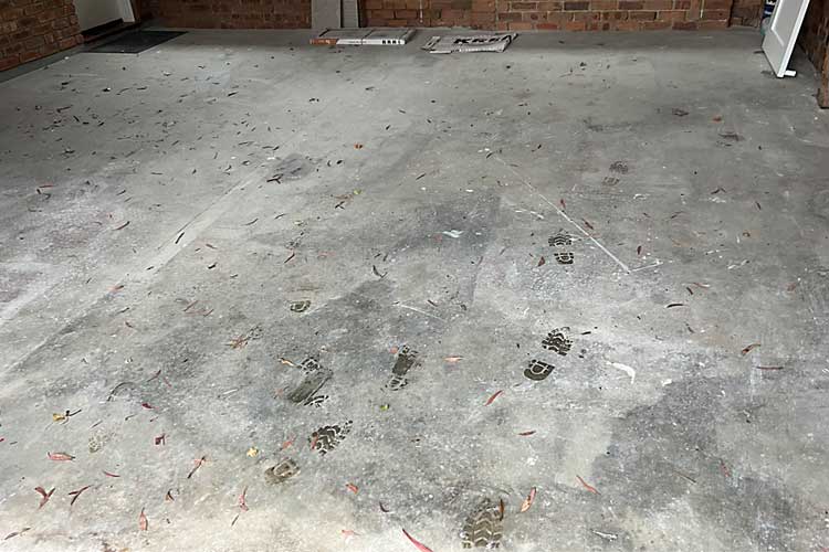 garage concrete floor before treatments